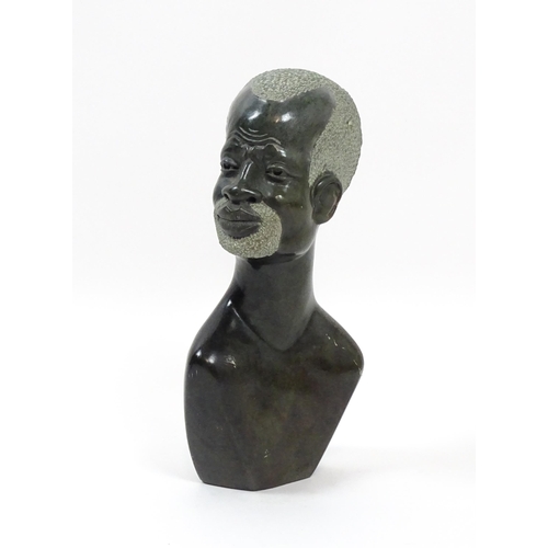 1152 - Ethnographic / Native / Tribal : An African carved soapstone bust modelled as the head of a bearded ... 