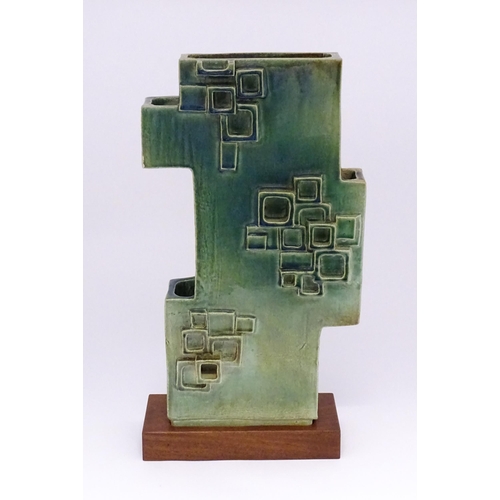 136 - An abstract studio pottery sculpture / vase with square detail by Stephen Bailey. Stamped to base. A... 