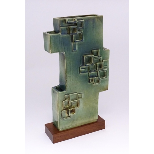 136 - An abstract studio pottery sculpture / vase with square detail by Stephen Bailey. Stamped to base. A... 