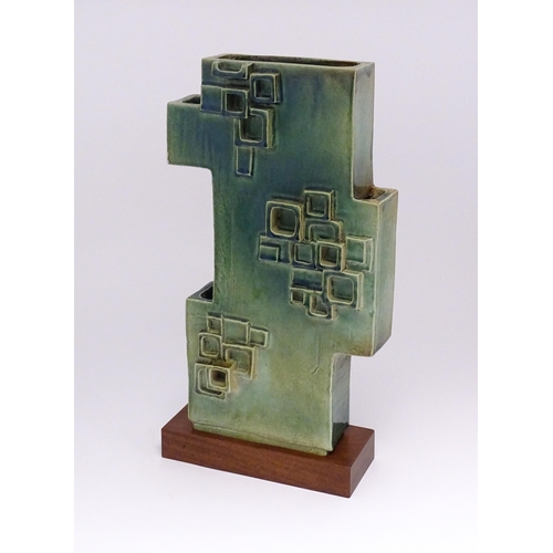 136 - An abstract studio pottery sculpture / vase with square detail by Stephen Bailey. Stamped to base. A... 