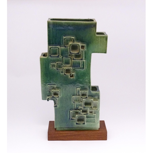 136 - An abstract studio pottery sculpture / vase with square detail by Stephen Bailey. Stamped to base. A... 