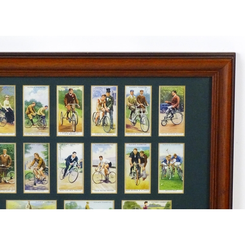 2150 - A quantity of Players & Sons cigarette cards from the Cycling series, framed. Together with a quanti... 