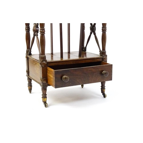 1492 - An early 19thC mahogany whatnot Canterbury surmounted by turned uprights and a small shelf above thr... 