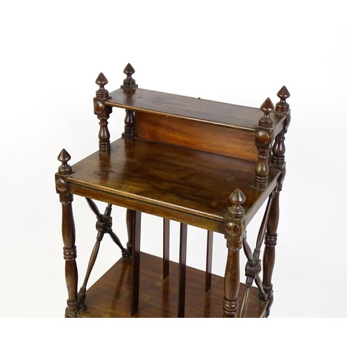 1492 - An early 19thC mahogany whatnot Canterbury surmounted by turned uprights and a small shelf above thr... 