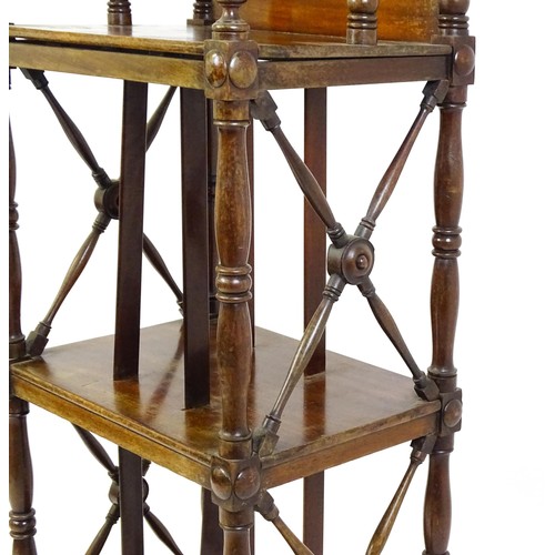 1492 - An early 19thC mahogany whatnot Canterbury surmounted by turned uprights and a small shelf above thr... 