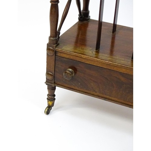 1492 - An early 19thC mahogany whatnot Canterbury surmounted by turned uprights and a small shelf above thr... 