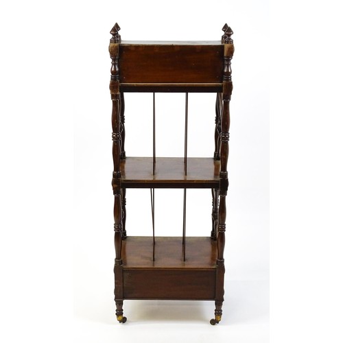 1492 - An early 19thC mahogany whatnot Canterbury surmounted by turned uprights and a small shelf above thr... 