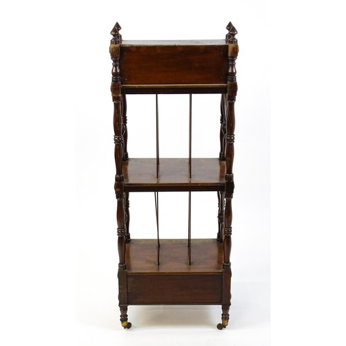 1492 - An early 19thC mahogany whatnot Canterbury surmounted by turned uprights and a small shelf above thr... 