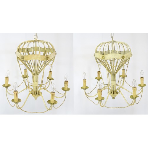 1406 - Two pendant ceiling lights / electroliers formed as stylised hot air balloons and having six branche... 