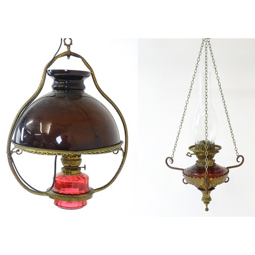 1409 - A Hinks & Son hanging pendant oil lamp. Together with another. Largest approx. 18