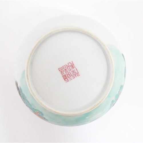 20 - A Chinese bowl decorated with geese in a landscape. Character marks under. Approx. 2 3/4