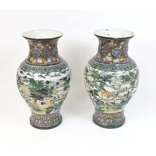 51 - A pair of large Chinese famille verte vases decorated with farming scenes with figures harvesting fi... 