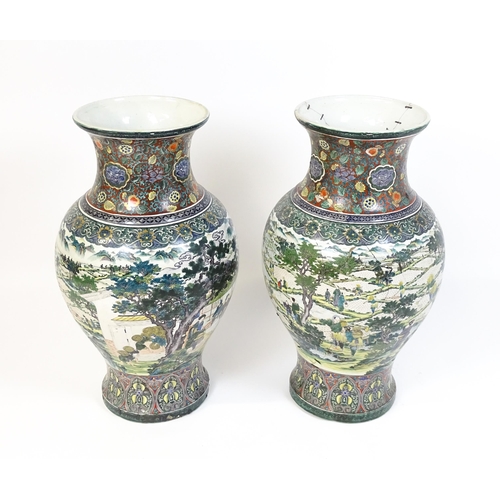 51 - A pair of large Chinese famille verte vases decorated with farming scenes with figures harvesting fi... 