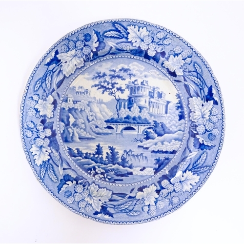 70 - A Minton blue and white plate in the Italian Ruins pattern. Marked under. Approx. 10