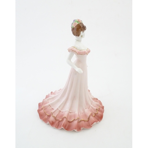 131 - A Coalport limited edition lady Celebration no. 1406 / 1750. Marked under. Approx. 8 3/4