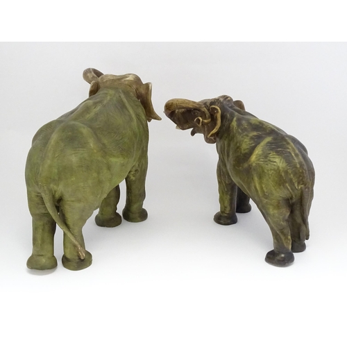 143 - Two large Royal Dux models of elephants. The smaller elephant with pink triangle mark and numbered 8... 