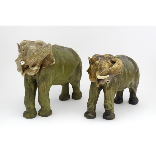 143 - Two large Royal Dux models of elephants. The smaller elephant with pink triangle mark and numbered 8... 