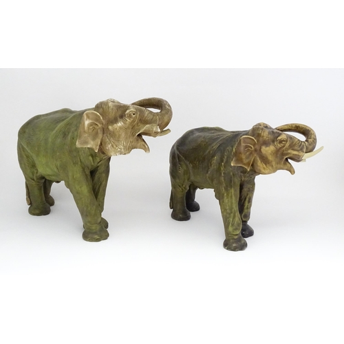 143 - Two large Royal Dux models of elephants. The smaller elephant with pink triangle mark and numbered 8... 