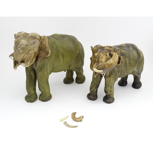 143 - Two large Royal Dux models of elephants. The smaller elephant with pink triangle mark and numbered 8... 