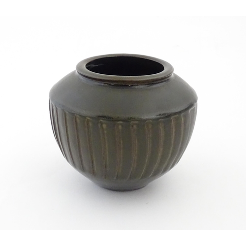 151 - A David Leach studio pottery vase / pot of tapering form with a unique gunmetal glaze commissioned b... 