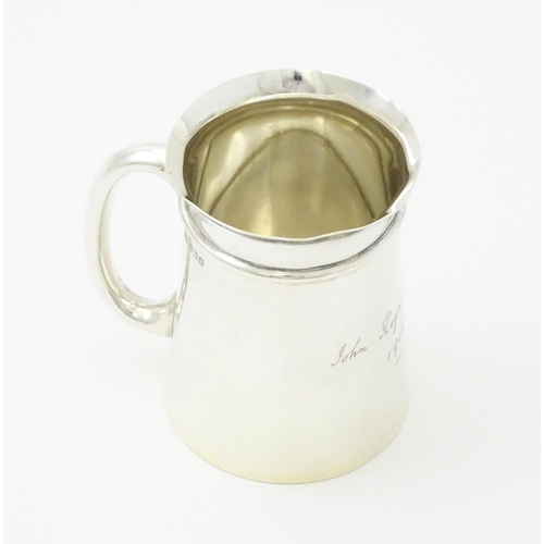 315 - A silver Christening mug hallmarked Sheffield 1906, maker Mappin & Webb. Approx. 3 1/2