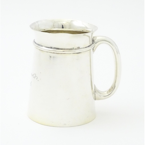 315 - A silver Christening mug hallmarked Sheffield 1906, maker Mappin & Webb. Approx. 3 1/2