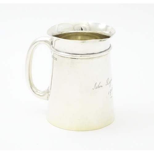 315 - A silver Christening mug hallmarked Sheffield 1906, maker Mappin & Webb. Approx. 3 1/2