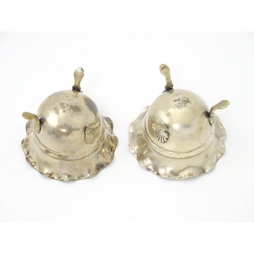 334 - A pair of silver salts with crimped rims and raised on 3 paw feet. Hallmarked Birmingham 1931 maker ... 