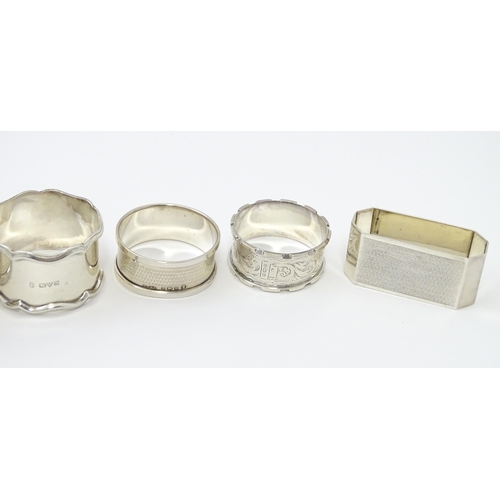 335 - Seven assorted silver napkin rings, various dates and makers to include an Art Deco example hallmark... 