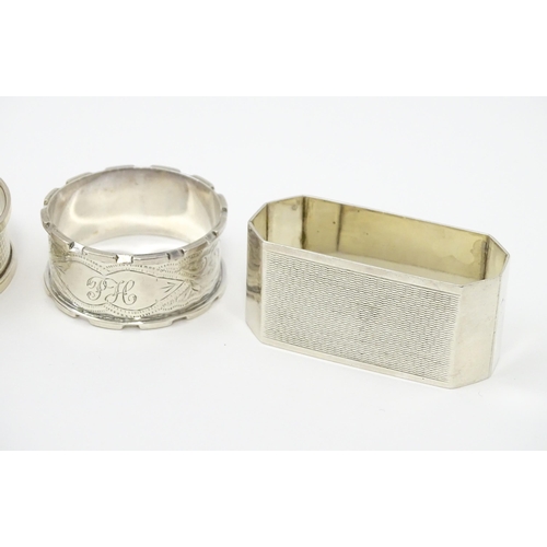 335 - Seven assorted silver napkin rings, various dates and makers to include an Art Deco example hallmark... 