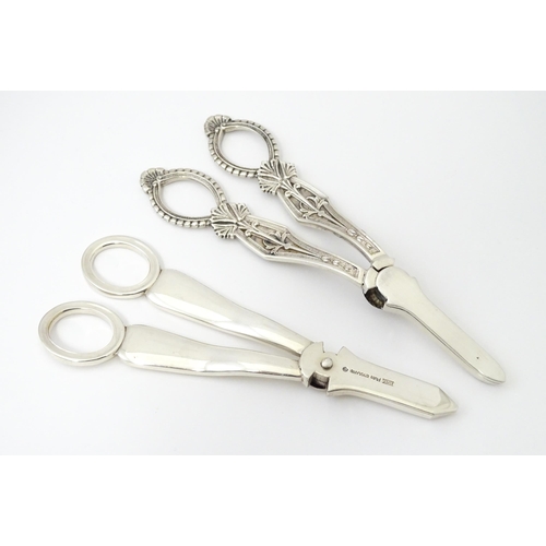 347 - Two silver plate grape scissors / shears. Approx 6 1/2