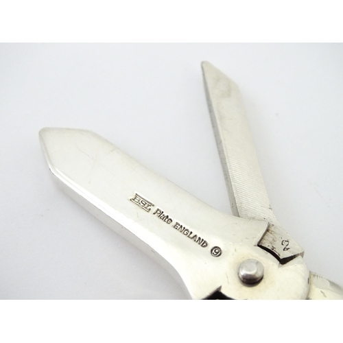 347 - Two silver plate grape scissors / shears. Approx 6 1/2