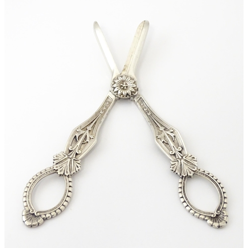 347 - Two silver plate grape scissors / shears. Approx 6 1/2