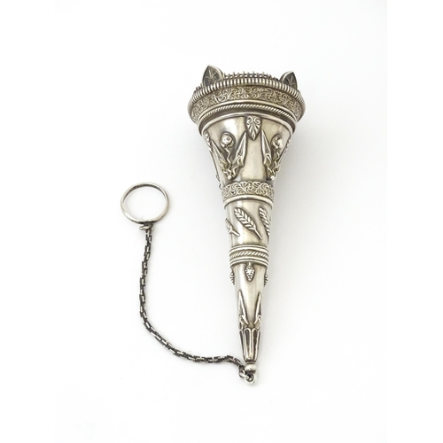 363 - A Victorian white metal posy holder of conical form with wirework detail, floral, acanthus scroll an... 