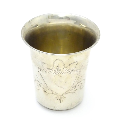 370 - A .800 silver beaker with engraved decoration. Possibly Israeli. Approx. 2 1/2