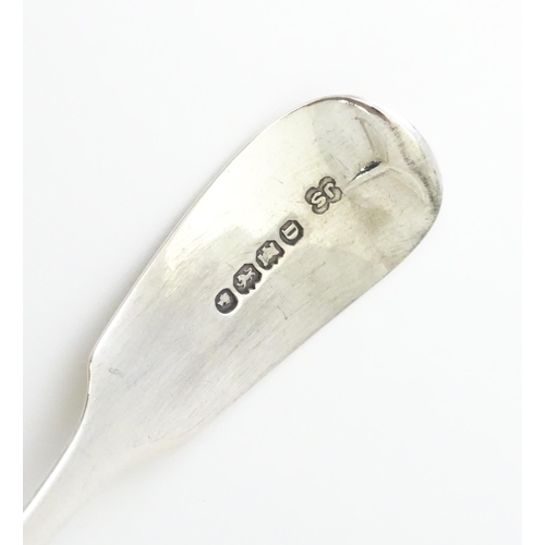 432 - A Victorian silver Fiddle pattern sauce ladle hallmarked Exeter 1860, maker John Stone. Approx. 5 3/... 