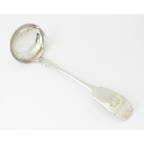 432 - A Victorian silver Fiddle pattern sauce ladle hallmarked Exeter 1860, maker John Stone. Approx. 5 3/... 