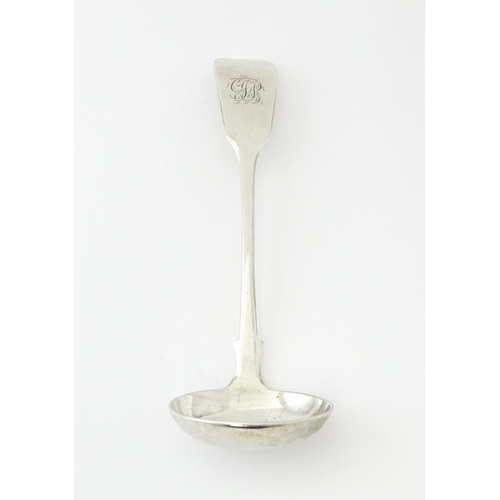 432 - A Victorian silver Fiddle pattern sauce ladle hallmarked Exeter 1860, maker John Stone. Approx. 5 3/... 