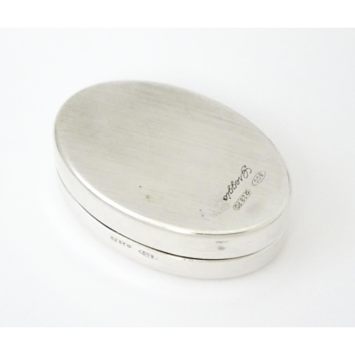 439 - A Continental .800 Italian silver pill box by Greggio. Approx 1 1/2