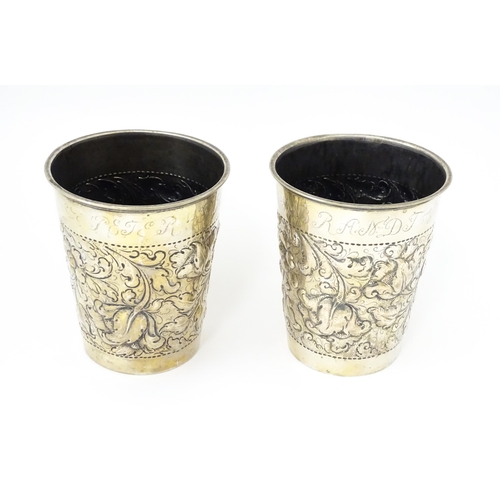 472 - Scandinavian silver : Two early 20thC Danish silver large beakers with floral and acanthus scroll de... 