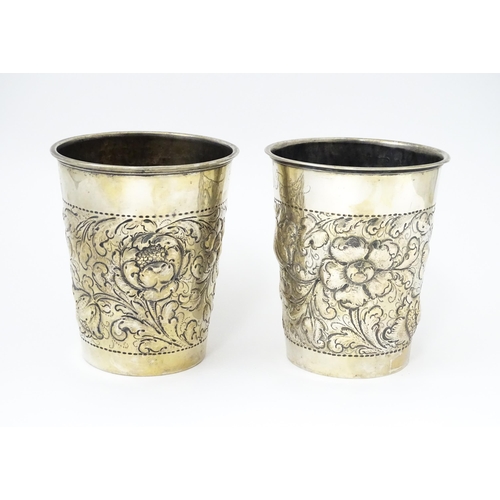 472 - Scandinavian silver : Two early 20thC Danish silver large beakers with floral and acanthus scroll de... 