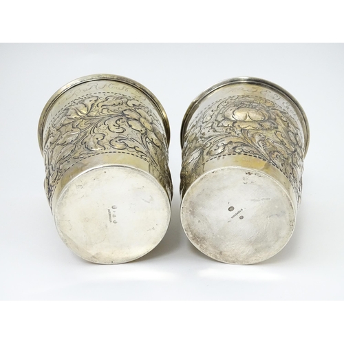 472 - Scandinavian silver : Two early 20thC Danish silver large beakers with floral and acanthus scroll de... 