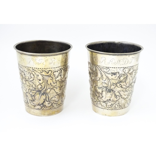 472 - Scandinavian silver : Two early 20thC Danish silver large beakers with floral and acanthus scroll de... 