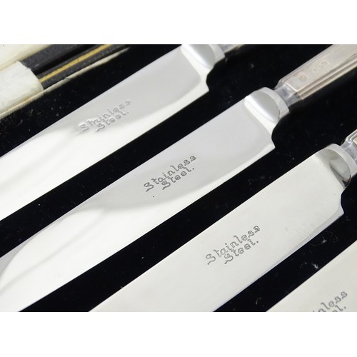 490 - A cased set of six silver handled tea / butter knives hallmarked Sheffield 1932, maker Thomas Bradbu... 