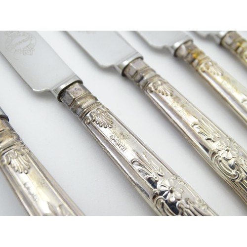 491 - A cased set of six silver handled tea knives, hallmarked Sheffield 1961, maker Harrison Brothers. Ca... 