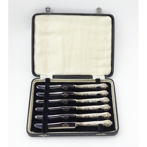 491 - A cased set of six silver handled tea knives, hallmarked Sheffield 1961, maker Harrison Brothers. Ca... 