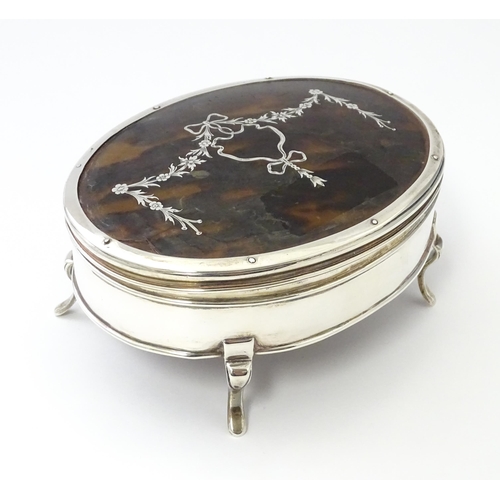 227 - A silver jewellery box of oval form with tortoiseshell and pique work detail to lid, hallmarked Lond... 