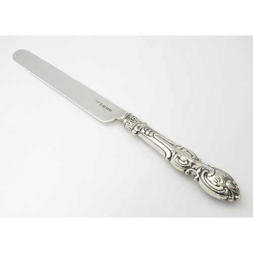 238 - A Victorian silver cake knife hallmarked Birmingham 1856, maker Hilliard & Thomason. Approx. 8 1/4