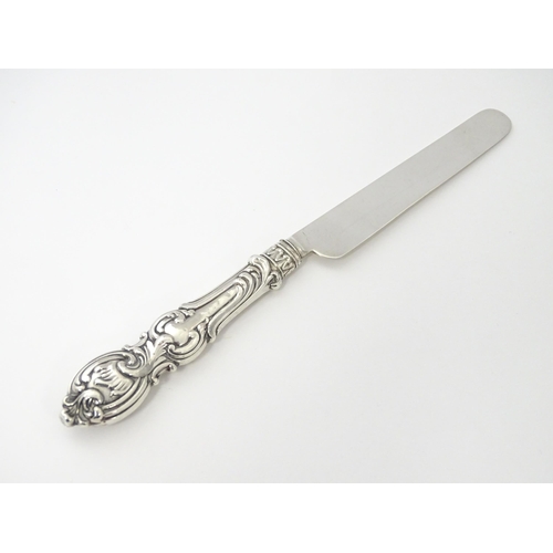 238 - A Victorian silver cake knife hallmarked Birmingham 1856, maker Hilliard & Thomason. Approx. 8 1/4