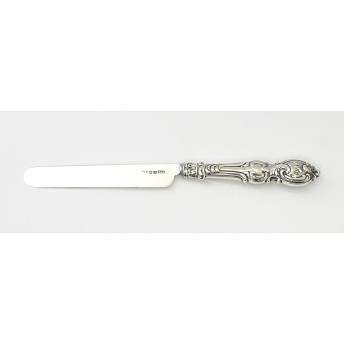 238 - A Victorian silver cake knife hallmarked Birmingham 1856, maker Hilliard & Thomason. Approx. 8 1/4